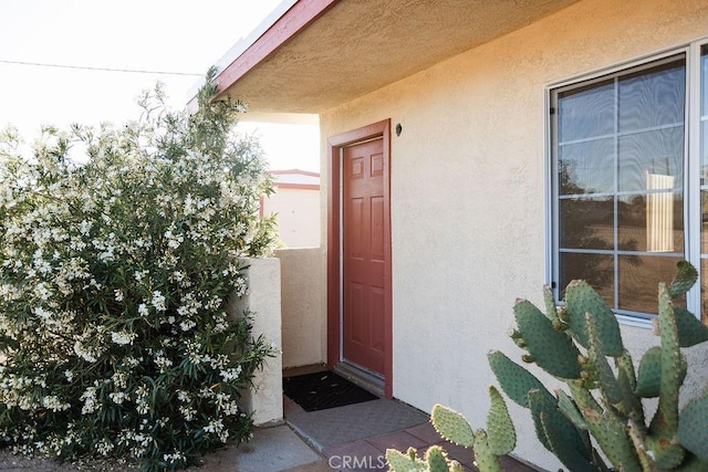 58382 Sunny Sands Dr, Yucca Valley, CA 92284 - entrance to property featuring stucco siding