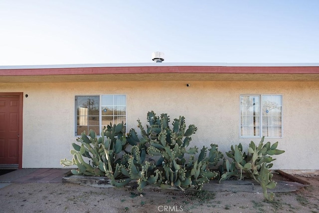58382 Sunny Sands Dr, Yucca Valley, CA 92284 - view of side of property featuring stucco siding