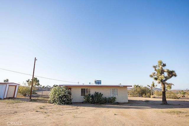 58382 Sunny Sands Dr, Yucca Valley, CA 92284 - view of front facade featuring stucco siding