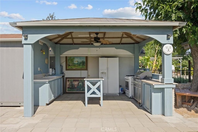 4436 County Road M 1/2, Orland, CA 95963 - view of patio / terrace featuring a gazebo, area for grilling, a ceiling fan, and a sink