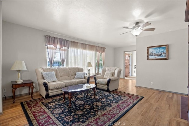 4436 County Road M 1/2, Orland, CA 95963 - living room featuring ceiling fan, light wood-style flooring, and baseboards