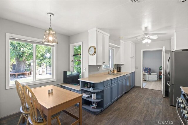 4436 County Road M 1/2, Orland, CA 95963 - kitchen featuring open shelves, appliances with stainless steel finishes, white cabinets, a sink, and light countertops