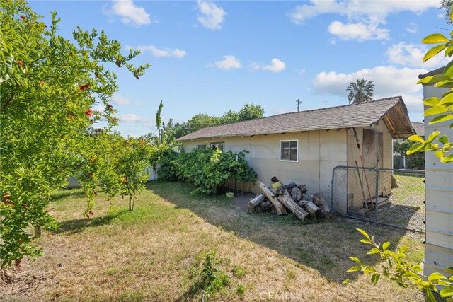 4436 County Road M 1/2, Orland, CA 95963 - view of side of property featuring roof with shingles