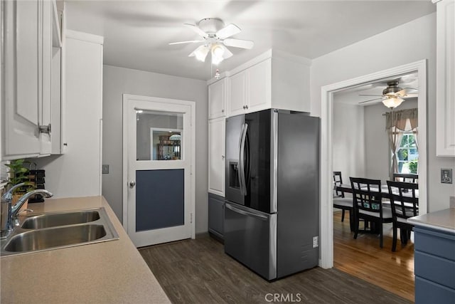 4436 County Road M 1/2, Orland, CA 95963 - kitchen featuring stainless steel fridge, a sink, a ceiling fan, white cabinets, and dark wood-type flooring