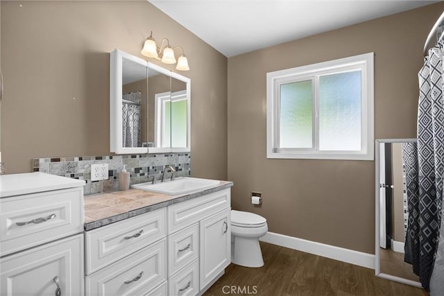 4436 County Road M 1/2, Orland, CA 95963 - full bath with plenty of natural light, vanity, wood finished floors, and toilet