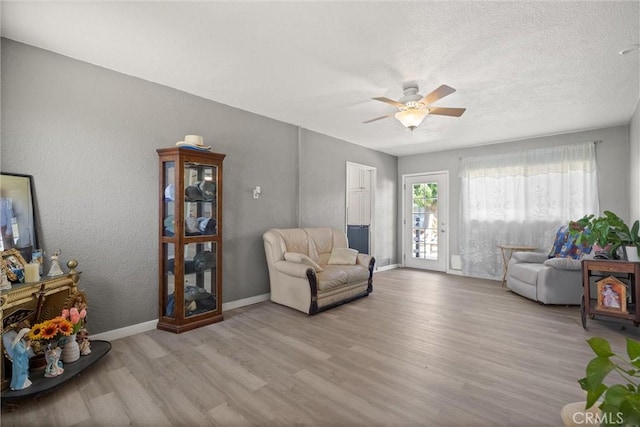 4436 County Road M 1/2, Orland, CA 95963 - living area featuring wood finished floors, ceiling fan, and baseboards