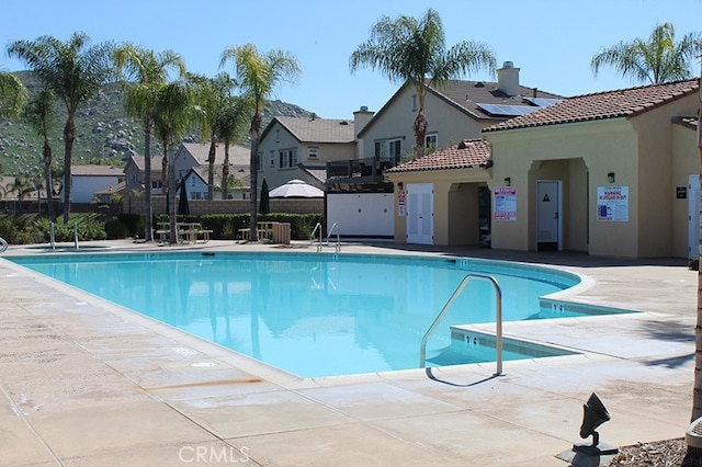 29778 Salmon St, Menifee, CA 92584 - community pool with a residential view and a patio area