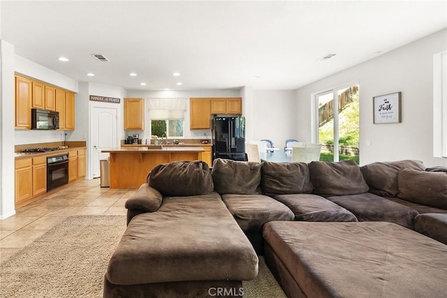 29778 Salmon St, Menifee, CA 92584 - living area featuring plenty of natural light, light tile patterned flooring, and recessed lighting