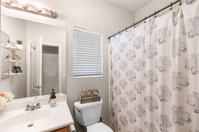 29778 Salmon St, Menifee, CA 92584 - bathroom featuring vanity, toilet, curtained shower, and a textured wall
