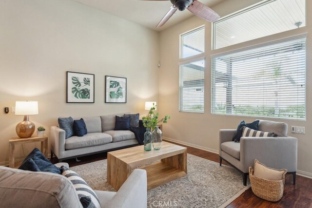 25863 Prospector Ct, Menifee, CA 92584 - living room featuring baseboards, dark wood-type flooring, and a ceiling fan