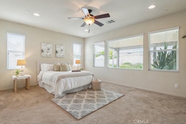 25863 Prospector Ct, Menifee, CA 92584 - carpeted bedroom featuring multiple windows, baseboards, recessed lighting, and ceiling fan