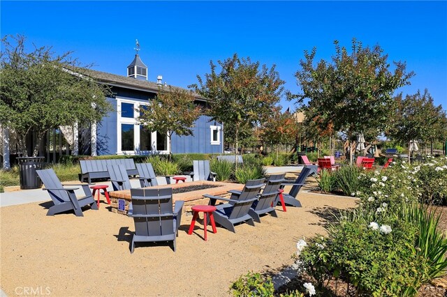 25863 Prospector Ct, Menifee, CA 92584 - view of patio / terrace featuring a fire pit