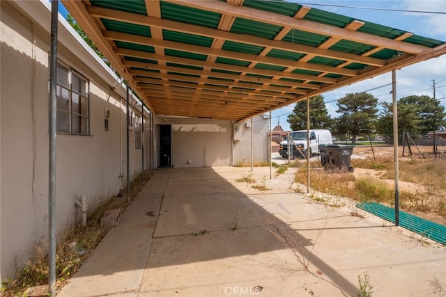 39026 11th St W, Palmdale, CA 93551 - view of patio / terrace featuring a carport