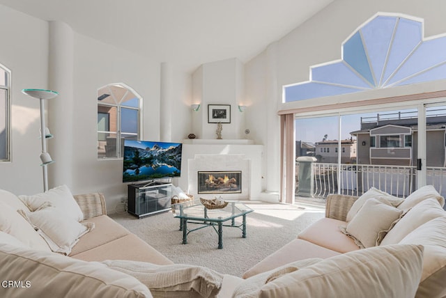 5331 Wavecrest Way, Oxnard, CA 93035 - carpeted living area with high vaulted ceiling and a glass covered fireplace