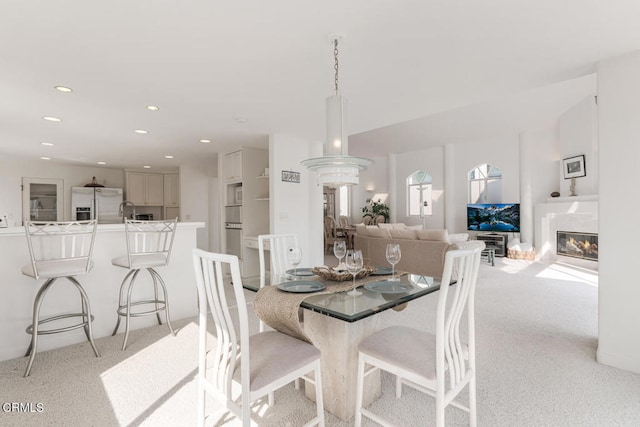 5331 Wavecrest Way, Oxnard, CA 93035 - dining room featuring light carpet, recessed lighting, and a glass covered fireplace