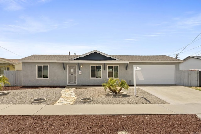 450 Dichter St, El Cajon, CA 92019 - ranch-style home featuring driveway, an attached garage, stucco siding, and roof with shingles