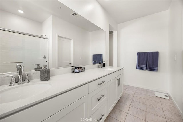 3720 S Allston Paseo Unit 7, Ontario, CA 91761 - full bathroom featuring double vanity, a shower stall, and baseboards