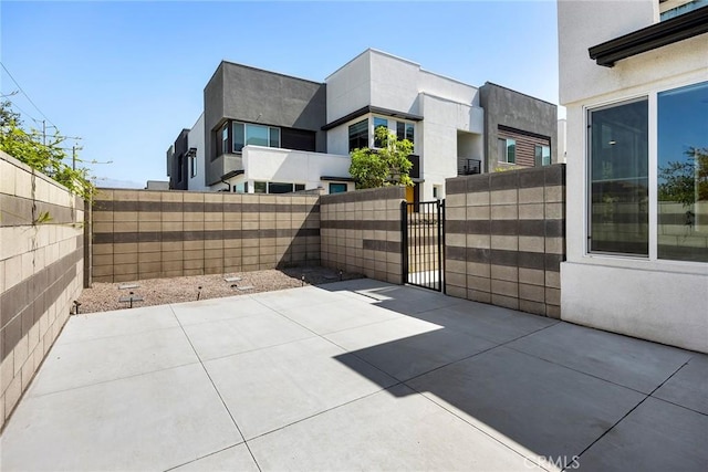 3720 S Allston Paseo Unit 7, Ontario, CA 91761 - fenced backyard featuring a patio and a gate