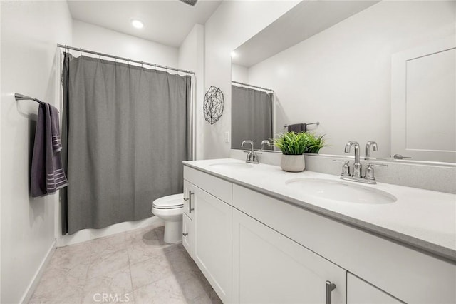 3720 S Allston Paseo Unit 7, Ontario, CA 91761 - full bathroom featuring toilet, double vanity, baseboards, marble finish flooring, and curtained shower