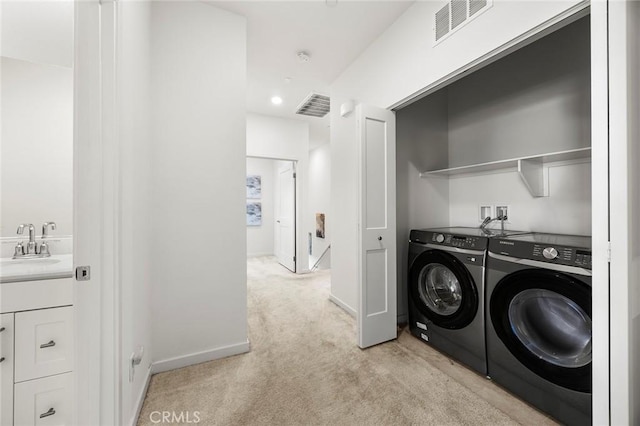 3720 S Allston Paseo Unit 7, Ontario, CA 91761 - washroom featuring washing machine and clothes dryer, light colored carpet, baseboards, and recessed lighting