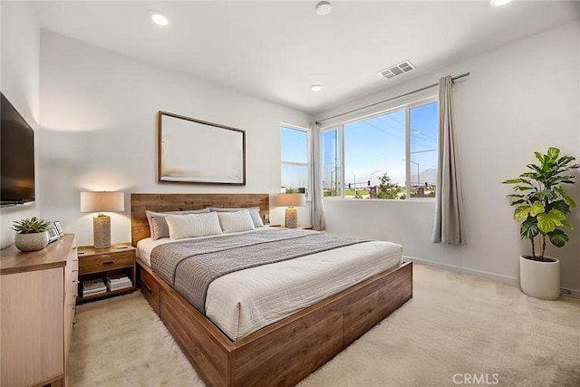 3720 S Allston Paseo Unit 7, Ontario, CA 91761 - bedroom with light colored carpet, baseboards, and recessed lighting