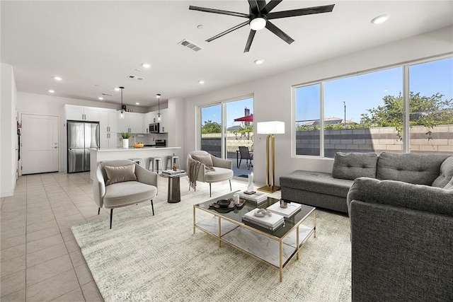3720 S Allston Paseo Unit 7, Ontario, CA 91761 - living area with a ceiling fan, light tile patterned floors, and recessed lighting