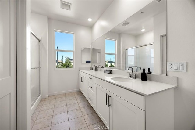 3720 S Allston Paseo Unit 7, Ontario, CA 91761 - full bathroom with plenty of natural light, double vanity, a stall shower, baseboards, and recessed lighting