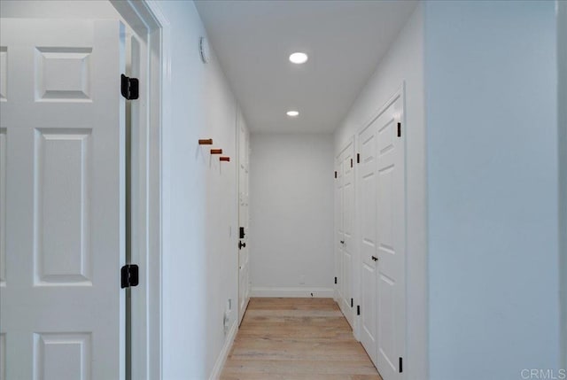 190 Del Mar Shores Ter Unit 24, Solana Beach, CA 92075 - hallway featuring recessed lighting, light wood finished floors, and baseboards