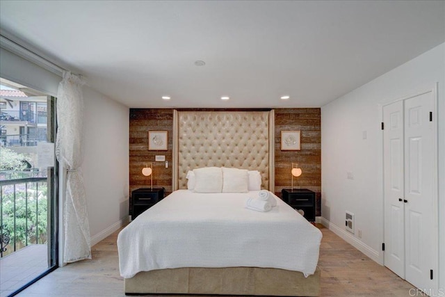 190 Del Mar Shores Ter Unit 24, Solana Beach, CA 92075 - bedroom with multiple windows, recessed lighting, light wood-type flooring, baseboards, and access to exterior