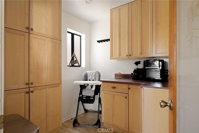 26249 Cedar Ln, Twin Peaks, CA 92391 - home office featuring light wood-type flooring and baseboards