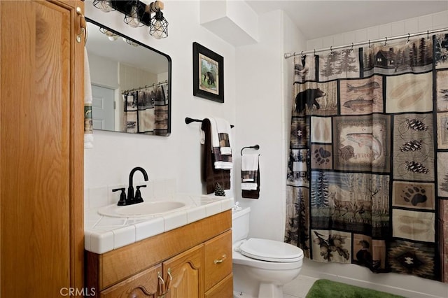 26249 Cedar Ln, Twin Peaks, CA 92391 - full bath with vanity, toilet, and tile patterned flooring