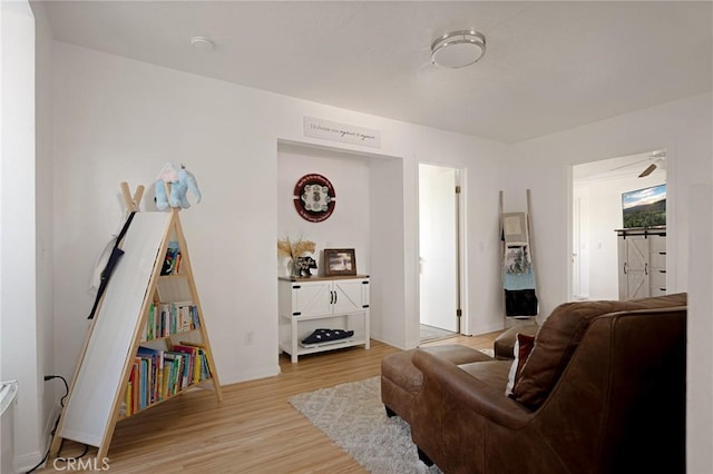 26249 Cedar Ln, Twin Peaks, CA 92391 - living area with light wood finished floors and baseboards