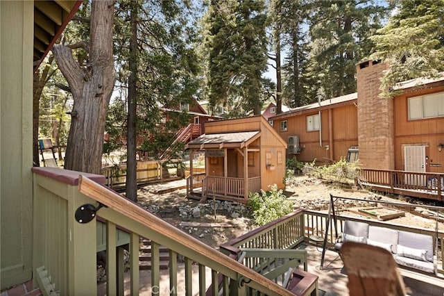 26249 Cedar Ln, Twin Peaks, CA 92391 - wooden terrace with an outbuilding
