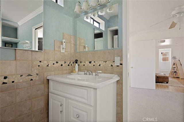 26249 Cedar Ln, Twin Peaks, CA 92391 - bathroom featuring crown molding, vanity, a ceiling fan, and tile walls
