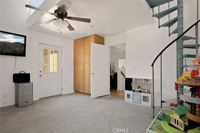 26249 Cedar Ln, Twin Peaks, CA 92391 - playroom with light colored carpet and ceiling fan