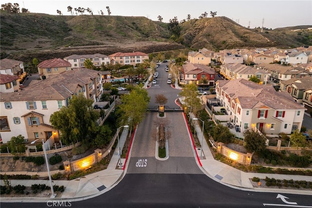 22124 Barrington Way, Saugus, CA 91350 - aerial view of property and surrounding area featuring nearby suburban area and a mountainous background