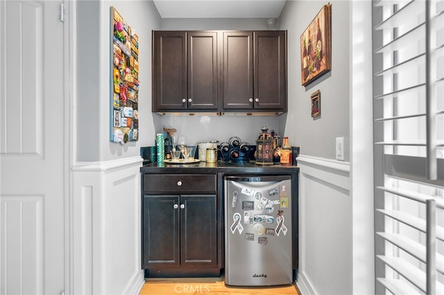 22124 Barrington Way, Saugus, CA 91350 - indoor dry bar featuring refrigerator and light wood finished floors