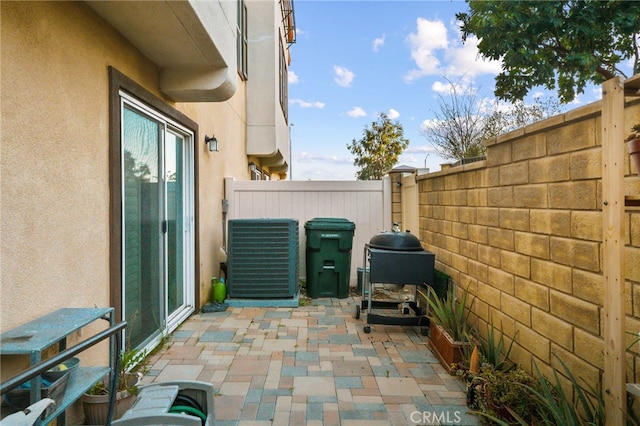 22124 Barrington Way, Saugus, CA 91350 - view of patio / terrace featuring a grill and cooling unit
