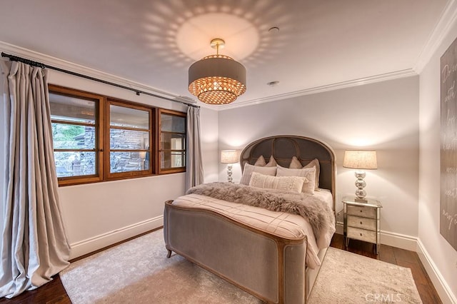 31742 Contijo Way, Coto De Caza, CA 92679 - bedroom with ornamental molding, wood finished floors, a chandelier, and baseboards