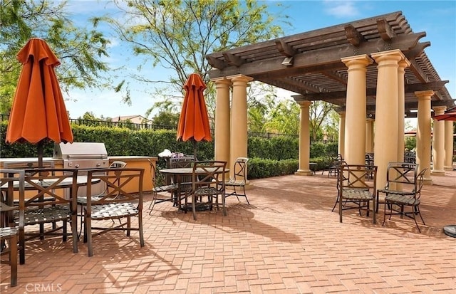 84 Plum Feather, Irvine, CA 92620 - view of patio / terrace with outdoor dining space, a pergola, and an outdoor kitchen