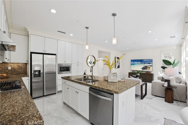84 Plum Feather, Irvine, CA 92620 - kitchen featuring stainless steel appliances, a sink, extractor fan, recessed lighting, and tasteful backsplash