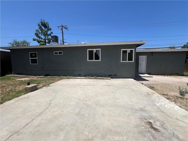 12055 Mount Vernon Ave, Grand Terrace, CA 92313 - view of front of property with crawl space, a patio, and stucco siding