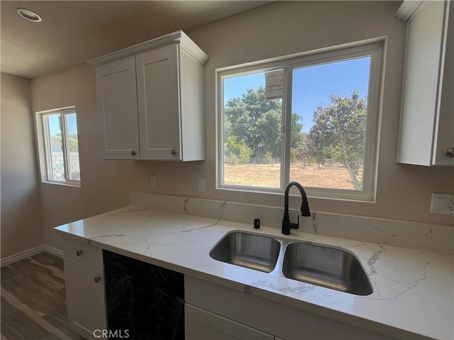 12055 Mount Vernon Ave, Grand Terrace, CA 92313 - kitchen with a sink, black dishwasher, healthy amount of natural light, and white cabinetry