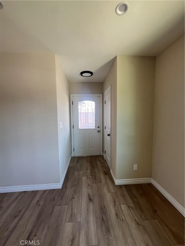 12055 Mount Vernon Ave, Grand Terrace, CA 92313 - entryway featuring baseboards and wood finished floors