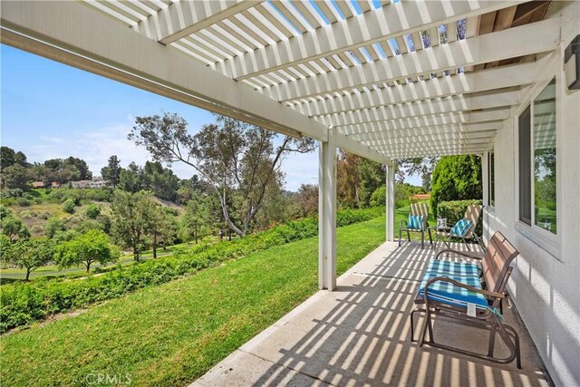28052 Espinoza, Mission Viejo, CA 92692 - view of patio / terrace with a pergola and view of wooded area