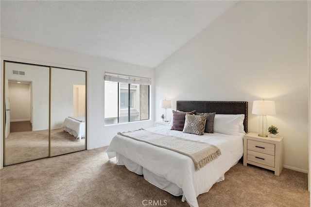 849 E Victoria St Unit 210, Carson, CA 90746 - bedroom with light colored carpet, lofted ceiling, and a closet
