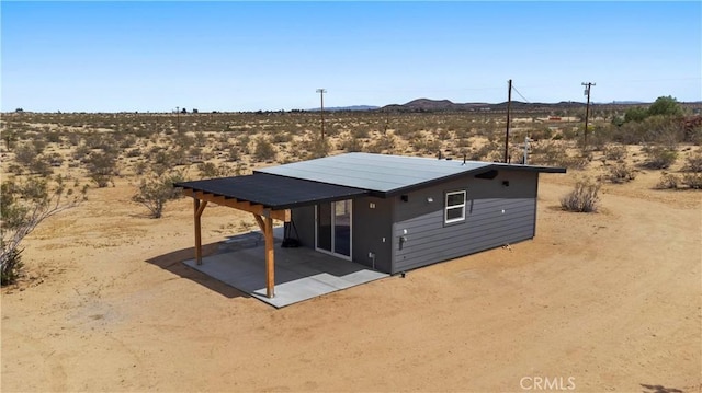 57628 Pine St, Landers, CA 92285 - view of outdoor structure with a mountain view and view of desert