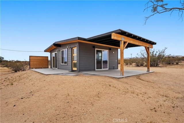 57628 Pine St, Landers, CA 92285 - back of house featuring a patio area