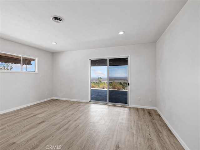31611 157th St E, Llano, CA 93544 - unfurnished room with light wood-type flooring, baseboards, and recessed lighting