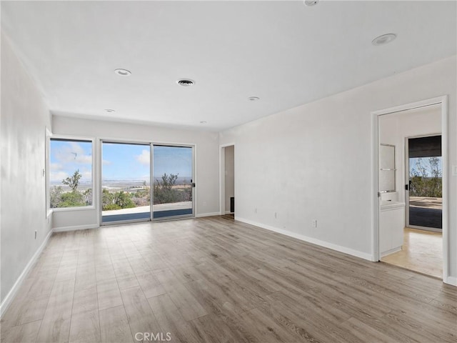 31611 157th St E, Llano, CA 93544 - empty room with wood finished floors and baseboards